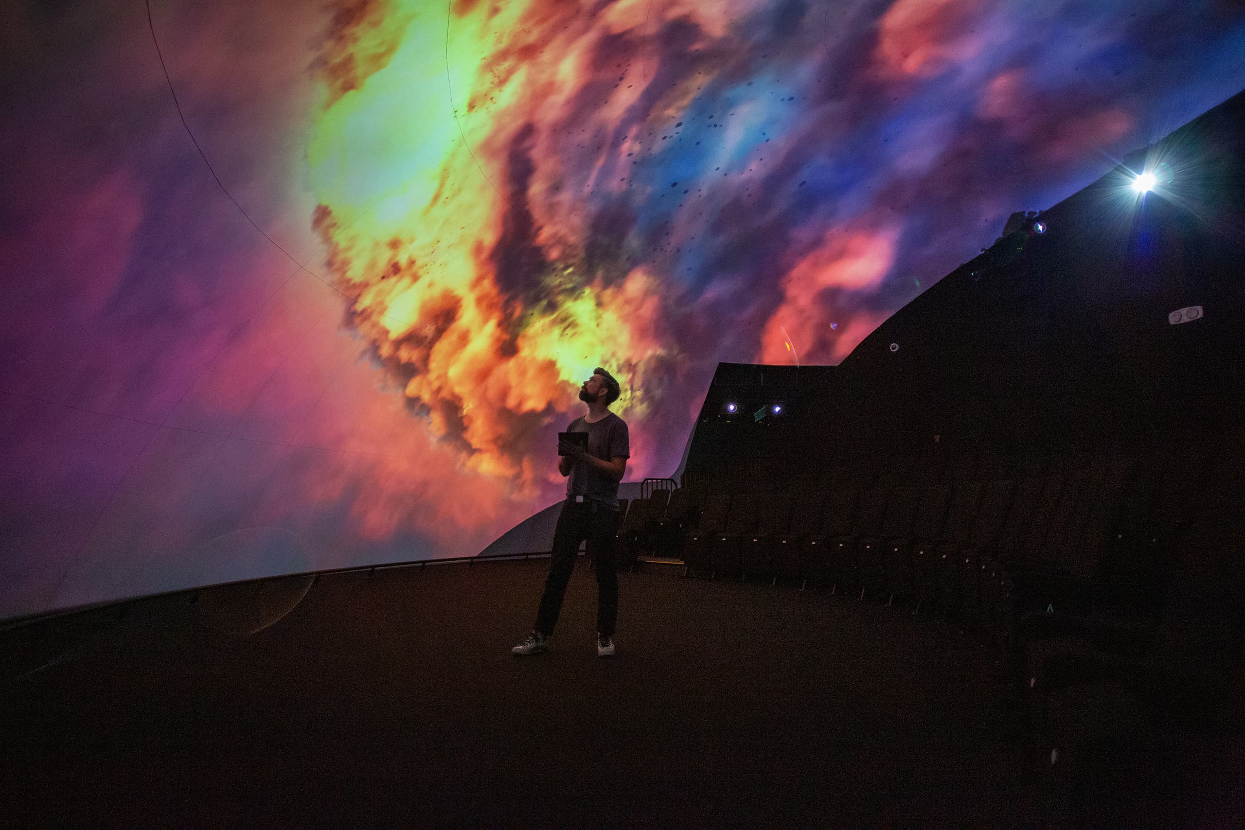 A person viewing the Screenberry-driven immersive screen at Jodrell Bank’s Space Dome Planetarium.
